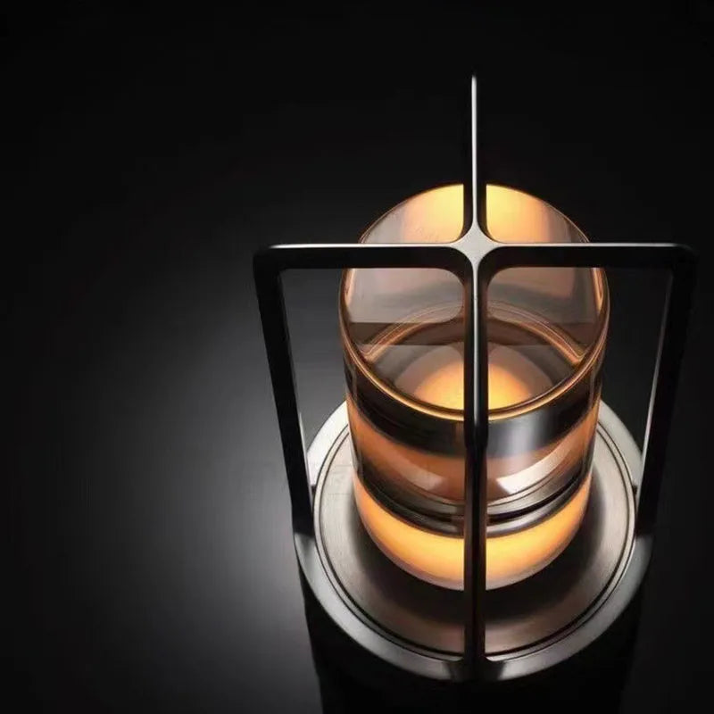 Original overhead close-up of the illuminated lamp showing the metal frame and light glowing at both ends