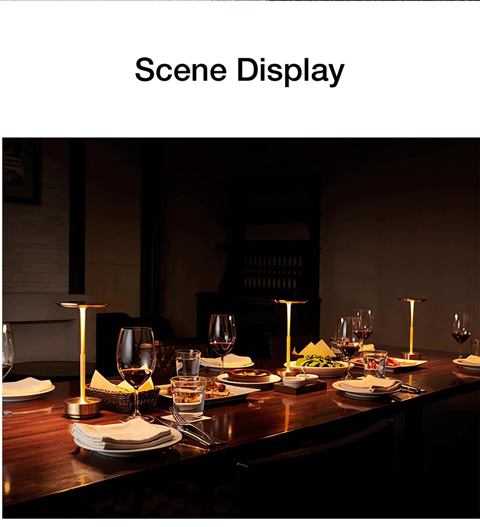 Golden Aura lamp on a dining table with flowers and place settings