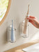 Wall‑Mounted Electric Toothbrush Holder — Clear Plastic Storage Rack